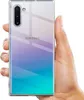 A hand holding a clear phone case with a gradient background. Produktbild-Vorschau