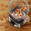 Almonds being chopped in a blender. Anteprima dell’immagine prodotto