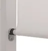 Close-up of a white roller blind mechanism attached to a white pole. Produktbild-Vorschau