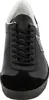 A close-up, front-facing view of a black sneaker. Produktbild-Vorschau