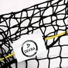 A close-up of a black net with a yellow elastic cord and a white label with a logo. Produktbild-Vorschau