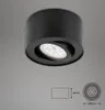 A black LED ceiling light with dimensions shown in diagrams. Voir les images du produit