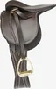 A brown toy pony saddle with a brass stirrup, shown against a white background. Náhľad obrázku produktu