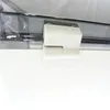 A close-up view of a white plastic hinge attached to a dark gray transparent plastic enclosure. Produktbild-Vorschau