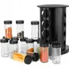 A spice rack with 16 glass jars filled with various spices, arranged around a black rotating stand. Produktbild-Vorschau