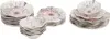 Several stacks of decorative plates with a floral-like pattern. Produktbild-Vorschau