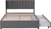 A grey upholstered bed frame with a slatted mattress base and two drawers pulled out from the side, shown against a white background. Anteprima dell’immagine prodotto