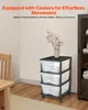 A three-drawer storage unit with casters is shown in a room setting. Produktbild-Vorschau