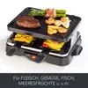 A raclette grill with food being cooked on it. Produktbild-Vorschau