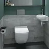 A modern bathroom with a wall-mounted toilet and a small sink. Produktbild-Vorschau