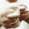 Hands kneading dough. Produktbild-Vorschau
