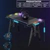 A gaming desk with LED lighting, shown with two kettlebells on top. Produktbild-Vorschau