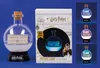 A collage showing a Harry Potter Polyjuice Potion lamp and its packaging, along with other color variations of the lamp. Náhľad obrázku produktu