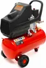 A red oil compressor with a black housing and handle, shown from a three-quarter angle on a white background. Náhľad obrázku produktu