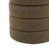 A stack of round, brown storage ottomans. Produktbild-Vorschau