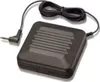 A black electronic device with a cord and plug, isolated on a white background. Produktbild-Vorschau