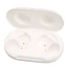 An open white charging case for wireless earbuds, showing the empty interior with charging contacts. Náhled obrázku produktu