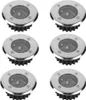 Six round, silver and black solar LED ground lights arranged in two columns of three. Voir les images du produit