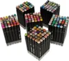 Several sets of black marker pens with colorful caps are arranged in a studio setting against a white background. Produktbild-Vorschau