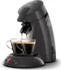 A dark gray Philips Senseo coffee machine brewing coffee into two clear glass mugs. Podgląd zdjęcia produktu