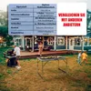 A family is enjoying a barbecue in their backyard with a BigDean Multifunktionstisch set up for food. Produktbild-Vorschau