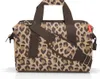 A leopard print duffel bag with brown straps and a detachable shoulder strap. Náhled obrázku produktu