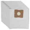 A stack of white vacuum cleaner bags with a brown cardboard attachment. Produktbild-Vorschau