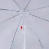Close-up view of the inside of a white umbrella with a leaf pattern. The umbrella's central pole and spokes are visible, along with a red button mechanism. Podgląd zdjęcia produktu