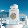A surreal, dreamlike scene with stylized trees and stairs, featuring a perfume bottle. Anteprima dell’immagine prodotto