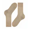 A pair of beige socks laid out on a white background. Produktbild-Vorschau