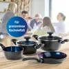 A family is gathered around a table, with cookware in the foreground. Anteprima dell’immagine prodotto