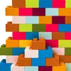 A wall constructed from colorful building blocks. Anteprima dell’immagine prodotto