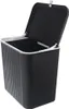 A black trash can with a white rim and an open lid, shown against a white background. Anteprima dell’immagine prodotto