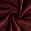 A close-up, swirling view of a plush, dark red fabric. Produktbild-Vorschau