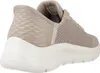 A side view of a beige Skechers slip-on shoe with a white sole. Anteprima dell’immagine prodotto