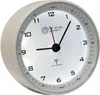 A close-up, angled view of a white analog alarm clock with a white face and black numbers. Produktbild-Vorschau