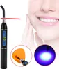 A dental curing light device is shown next to a smiling woman's face. Produktbild-Vorschau