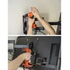 Two images showing a person installing a TV wall mount. The top image shows the mount being attached to the wall with a drill. The bottom image shows the mount being attached to the back of a TV. Produktbild-Vorschau