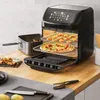 An air fryer oven is shown on a kitchen counter, with food inside and around it. Produktbild-Vorschau