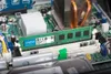 A close-up view of a computer's internal components, focusing on a RAM module installed on the motherboard. Náhľad obrázku produktu