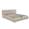 A beige upholstered bed frame with a slatted mattress base, shown from a three-quarter angle against a white background. Produktbild-Vorschau