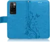 A blue flip case for a smartphone, decorated with a floral and butterfly pattern. Produktbild-Vorschau