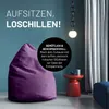 A purple beanbag chair is shown in a room with a red side table and a blue ottoman. Produktbild-Vorschau