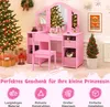 A pink children's vanity set with a chair, decorated for Christmas with a Christmas tree and gifts. Anteprima dell’immagine prodotto