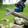 A person is using a blue Bosch chainsaw to cut a log in a grassy outdoor setting. Anteprima dell’immagine prodotto