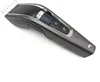 A close-up studio shot of a gray and black hair clipper against a white background. Produktbild-Vorschau
