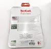 The back of a product package for a Tefal baking tray. Voir les images du produit