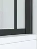 Close-up of a black framed shower screen on a white surface. Produktbild-Vorschau