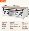 A white farmhouse-style coffee table with sliding barn doors and a wooden top, shown with dimensions and product specifications. Voir les images du produit