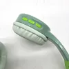 A close-up view of the side of a green headphone with three buttons on the earcup. Produktbild-Vorschau